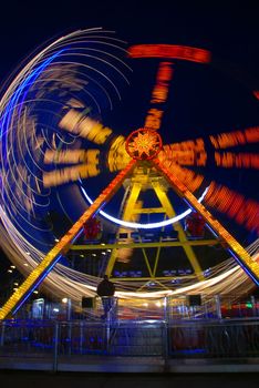 One of the crazy festival ferris wheels in Prague. Beautiful neon light show.