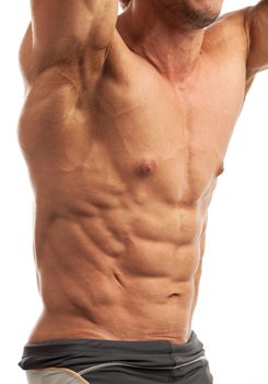 Male bodybuilder flexing his muscles over white background