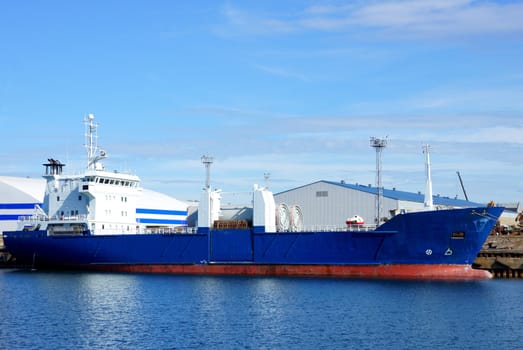 The cargo ship costs at a mooring