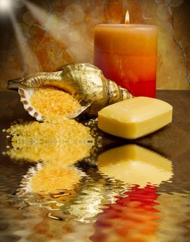 Soap and  flowers on wooden table