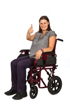 Cute young girl smiling in wheelchair