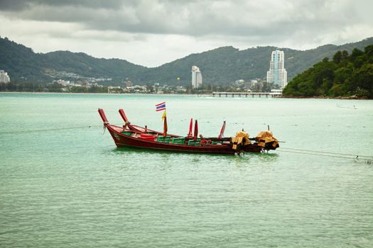 Thai longtail boats in the bay near Patong. Thailand
