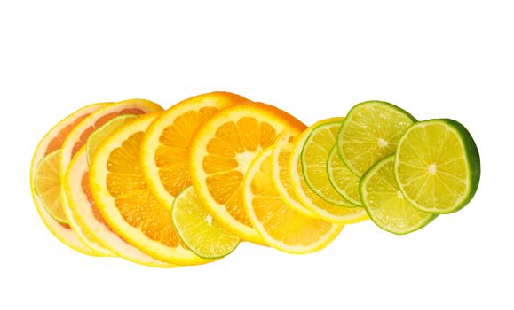 Vitamin C Overload, Stacks of sliced fruit isolated on white