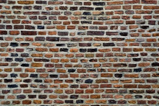 old parti-colored brick wall