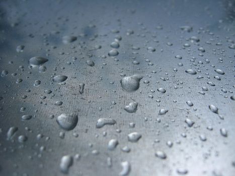 The image of droplets of water on glass