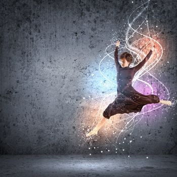 Girl dancing in a color dress with a gray background. Collage