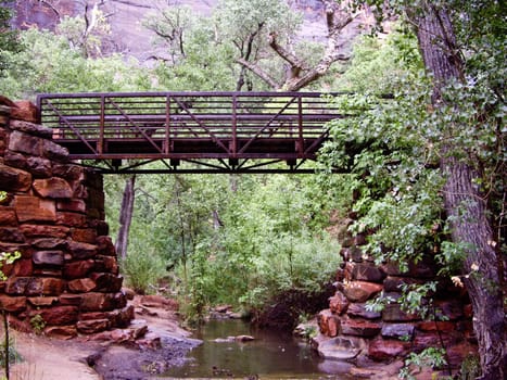 Metal bridge over river at Zion National Park