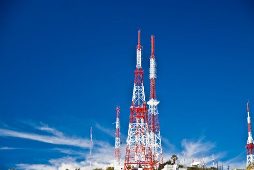 Communication towers on Mexican hillside