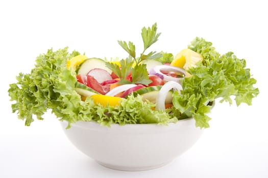 fresh tasty healthy salad with different vegetables isolated on white background