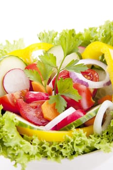 fresh tasty healthy salad with different vegetables isolated on white background