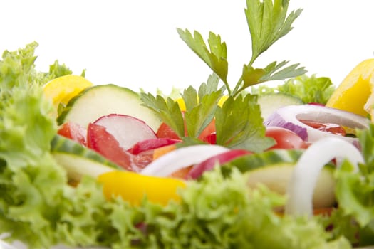 fresh tasty healthy salad with different vegetables isolated on white background