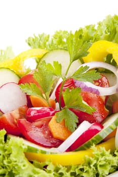 fresh tasty healthy salad with different vegetables isolated on white background