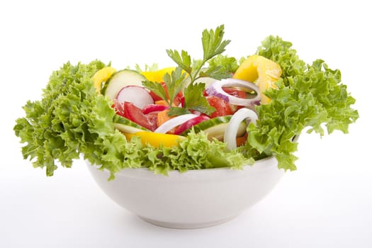 fresh tasty healthy salad with different vegetables isolated on white background