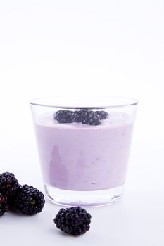 fresh tasty blackberry yoghurt shake dessert isolated on white background
