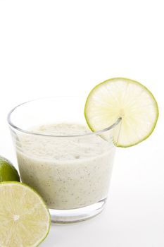 fresh tasty lime citrus yoghurt shake dessert isolated on white background