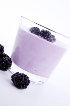 fresh tasty blackberry yoghurt shake dessert isolated on white background