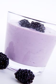 fresh tasty blackberry yoghurt shake dessert isolated on white background