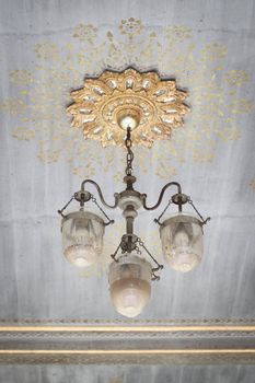 Antique lamp on the ceiling.