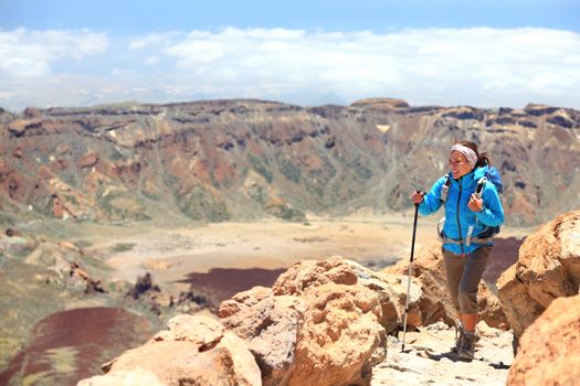 Woman hiking on volcano Teide, Tenerife. Hiker near summit of Teide during hike on Tenerife, Canary Islands, Spain.
