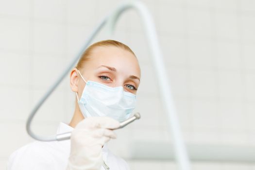 A portrait of a dental worker, dentist or assistant