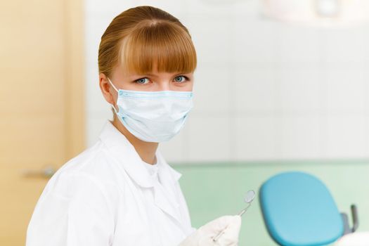 A portrait of a dental worker, dentist or assistant