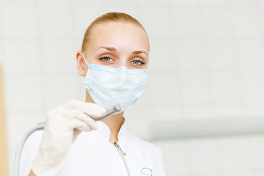 A portrait of a dental worker, dentist or assistant