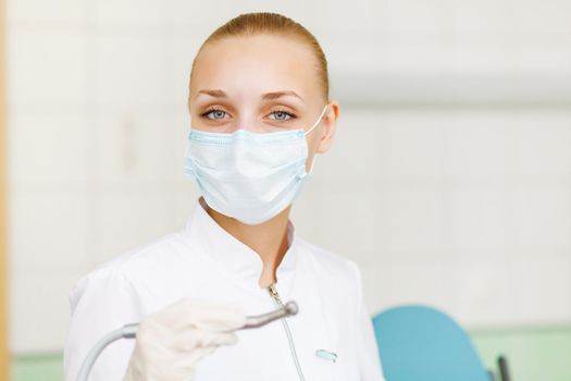 A portrait of a dental worker, dentist or assistant