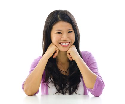 Portrait of cheerful Asian woman over white background