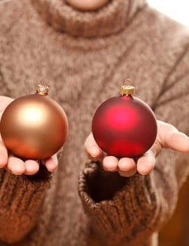 christmas ball in the hands