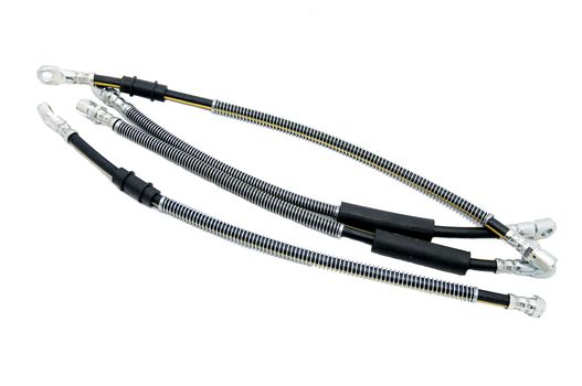 Several automotive hoses on a white background