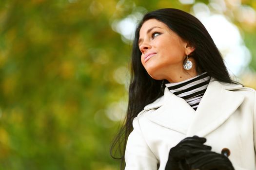  woman in yellow autumn park