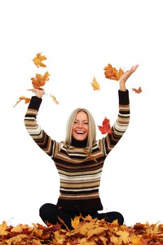  woman drop up autumn leaves in studio