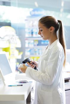 Portrait of a female pharmacist at pharmacy