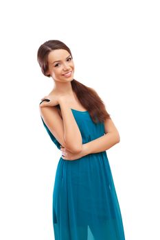 Beautiful young brunette woman in blue dress