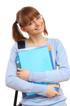 Happy smiling student standing and holding books