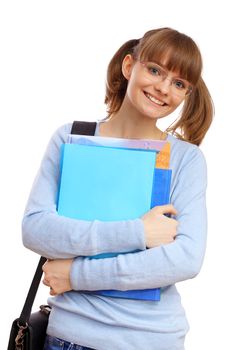 Happy smiling student standing and holding books