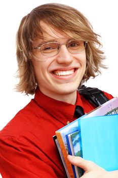 Happy smiling student standing and holding books