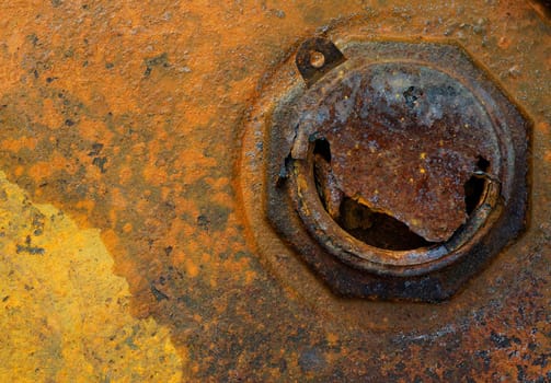 old rusty metal lid of the barrel