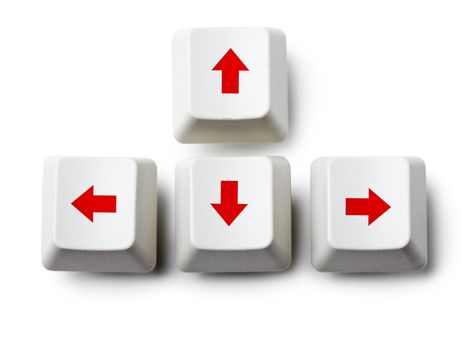Four cursor arrow keys on white background