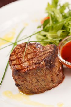 Grilled steak with sauce