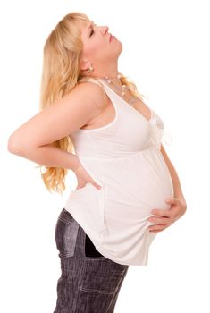 Pregnant woman suffers from back ache, isolated on white background