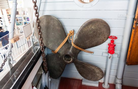 Photo of old screw propeller in museum