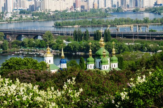 Vydubitsky monastery and blooming lilacs Kiev, Ukraine