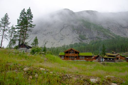 Typical Norwegian house in the village at mountain