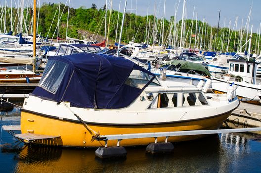 Old yellow boat  in the harbor Oslo, Norway