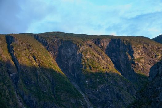 Norwegian mountains in the rays of the setting sun