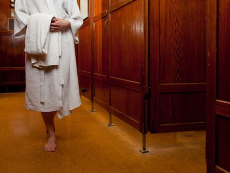 An abstract detail of a person in an old style european bath house and spa