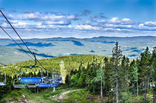 Ski lift chairs on summer's day Oslo, Norway