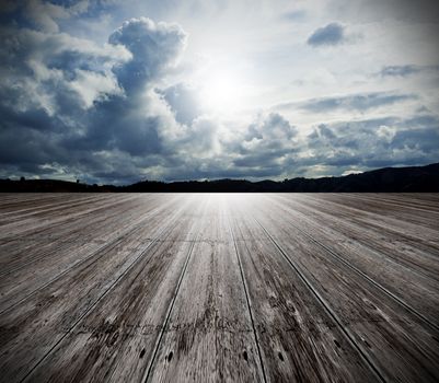 Background of old wood floor and cloudy sky