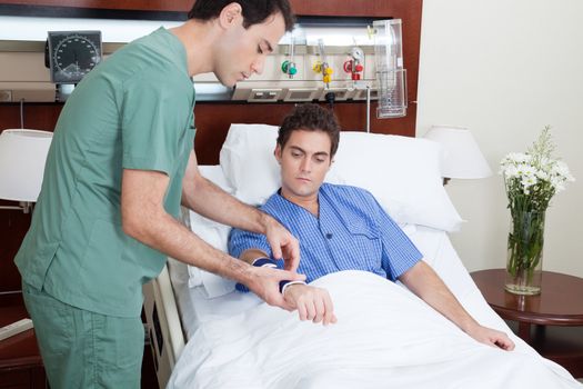 Technician doing a routine check up of the patient